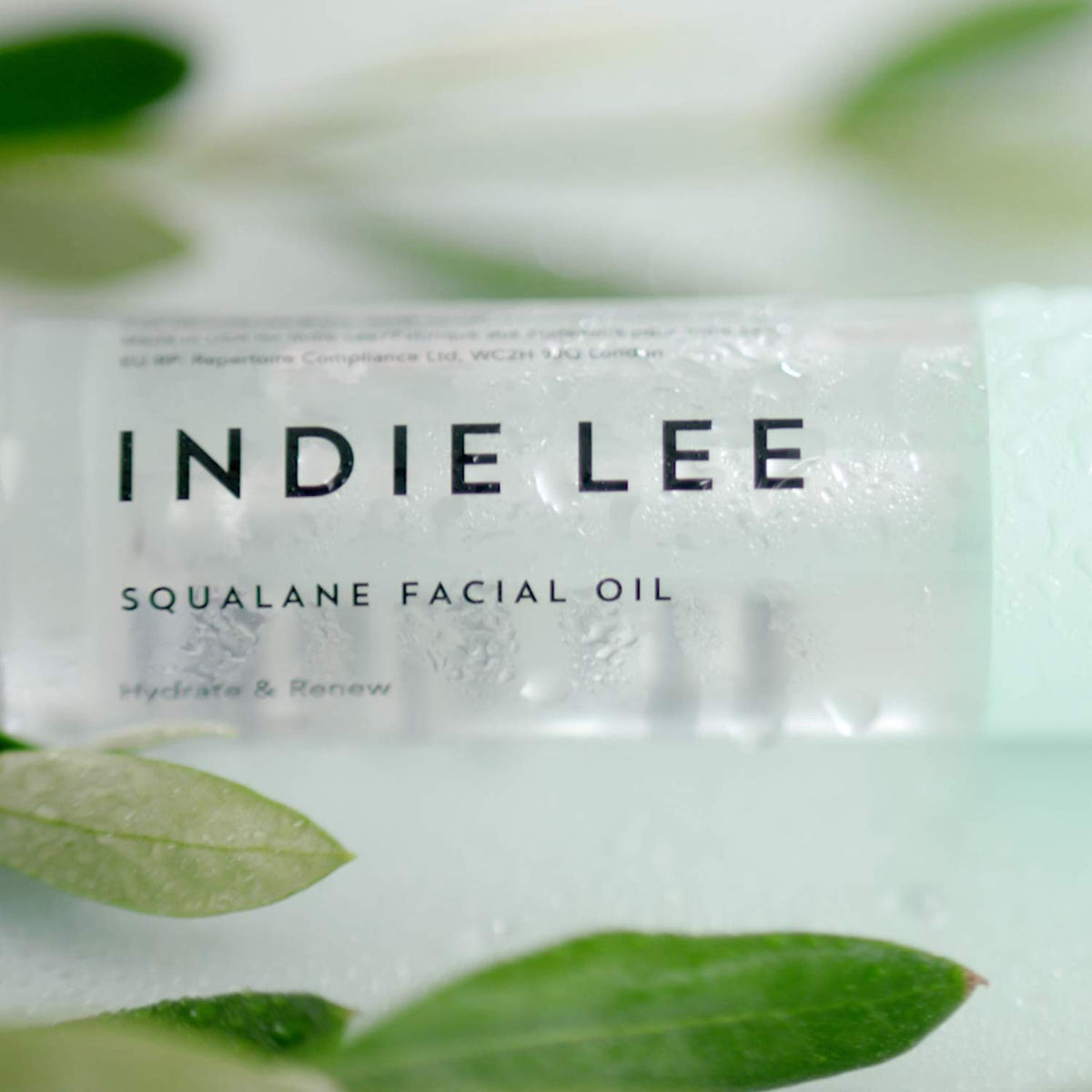 Indie Lee 100% Squalane Oil in lifestyle setting on vanity