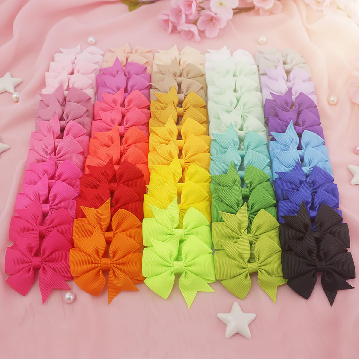 Infant wearing Babymatch Baby Hair Bows Clips in hair