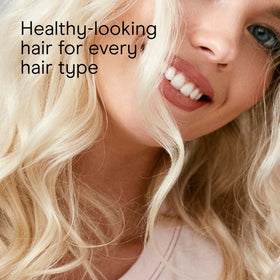 INFINITIPRO BY CONAIR Curling Iron with heat settings highlighted