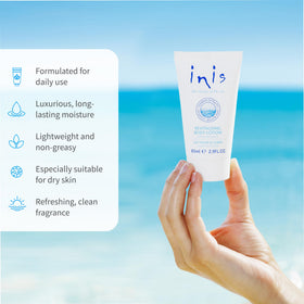 Inis Revitalizing Body Lotion 2.9 fl oz with sea background
