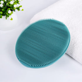 INNERNEED Silicone Body Cleansing Brush on a bathroom counter