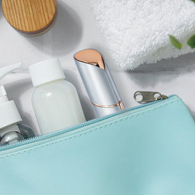 innobeaut facial hair remover in a makeup bag
