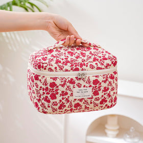 Inside view of uekeboag Large Travel Quilted Makeup Bag showing compartments