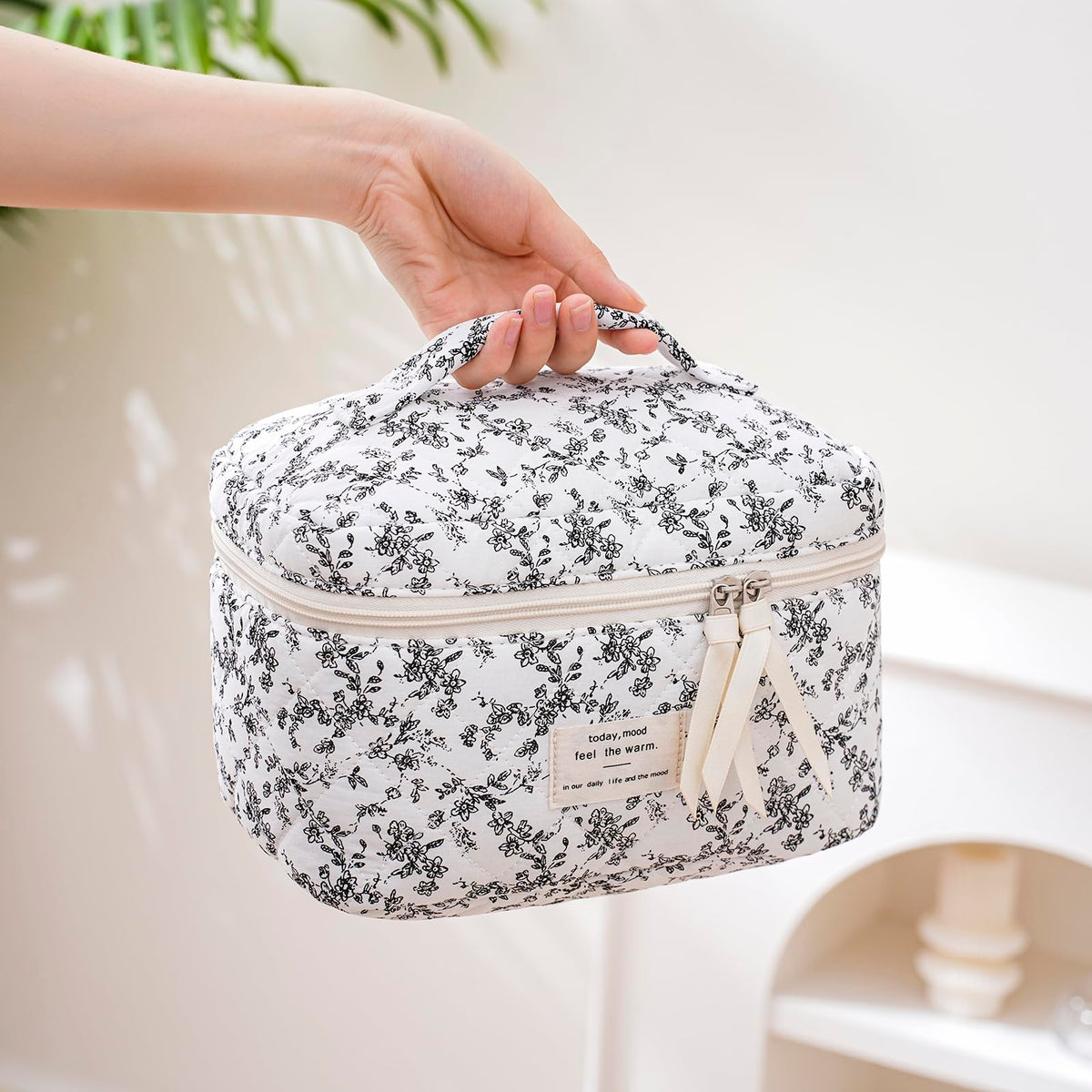 Inside view of uekeboag Large Travel Quilted Makeup Bag with compartments