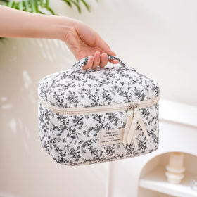 Inside view of uekeboag Large Travel Quilted Makeup Bag with compartments