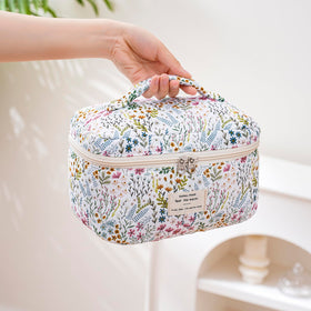 Inside view of uekeboag Large Travel Quilted Makeup Bag with contents