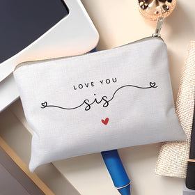 Interior of HubbgDesign Love You Sister Makeup Case filled with cosmetics