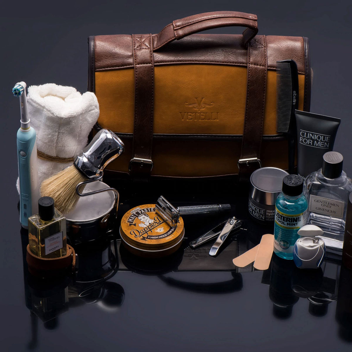 Interior view of Vetelli Leather Toiletry Bag with snap-fastened pockets