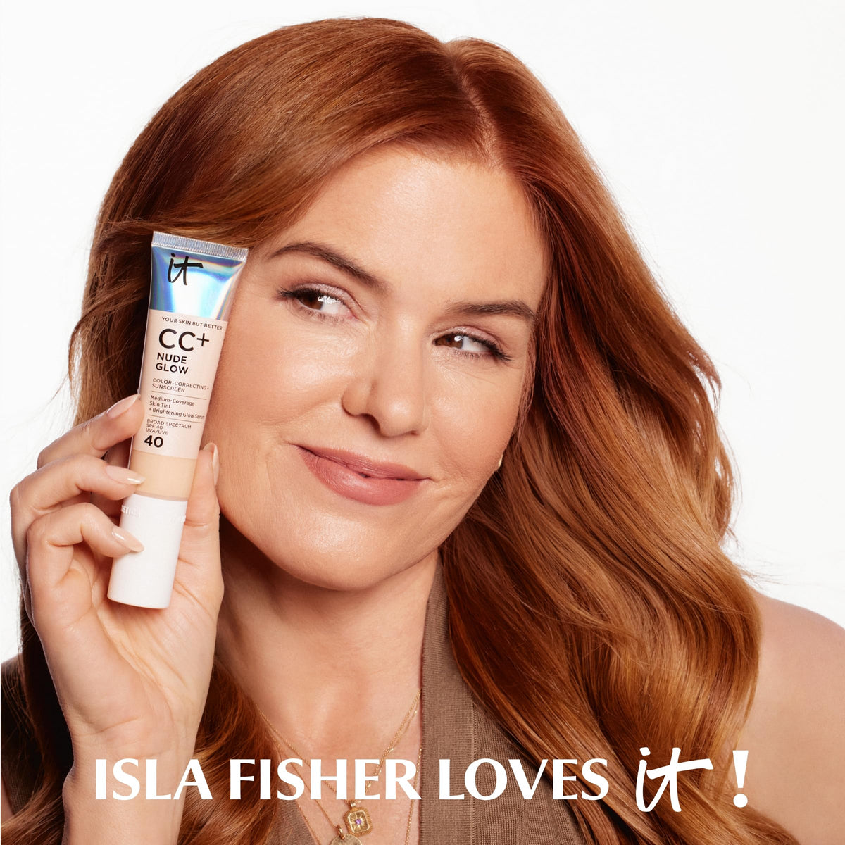 IT Cosmetics CC+ Cream Nude Glow SPF 40 Light on a makeup table