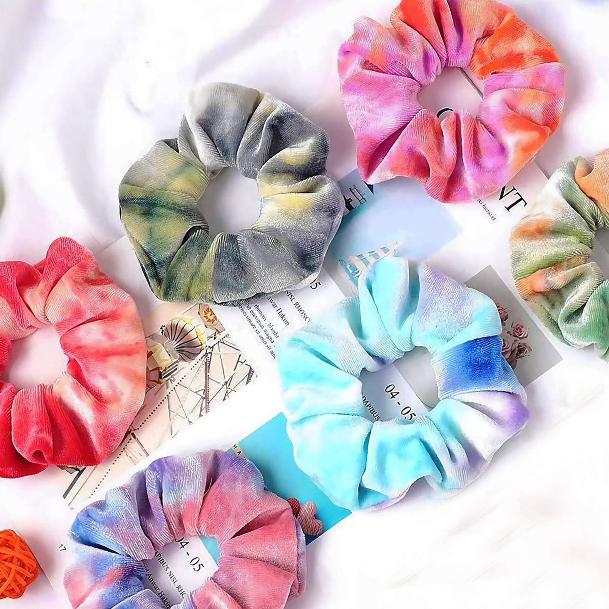 IVARYSS Tie Dye Velvet Scrunchies displayed in a colourful arrangement