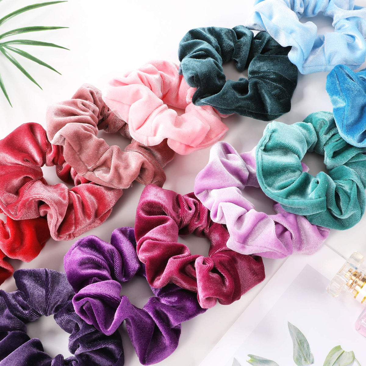 IVARYSS Velvet Scrunchie holding a ponytail securely