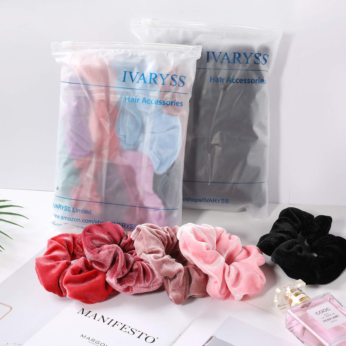 IVARYSS Velvet Scrunchies in a hand showing their size