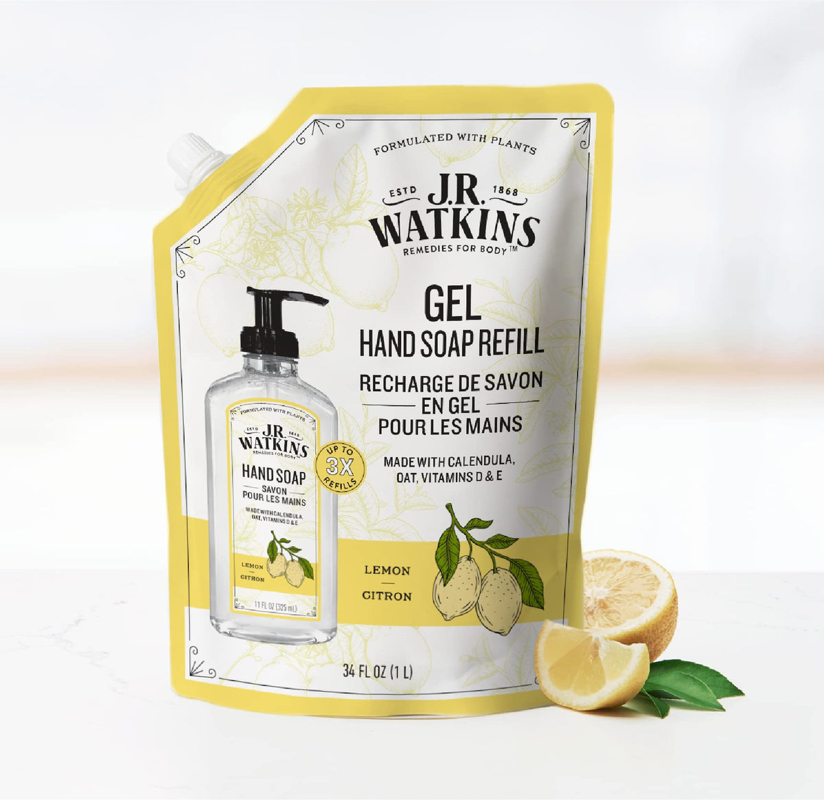 J.R. Watkins Gel Hand Soap in a dispenser with lemon slices
