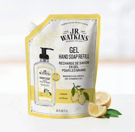 J.R. Watkins Gel Hand Soap in a dispenser with lemon slices