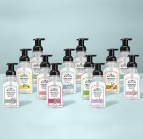 J.R. Watkins Moisturizing Foam Hand Soap dispenser with floral background