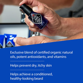 Jack Black Beard Oil drops in palm for application