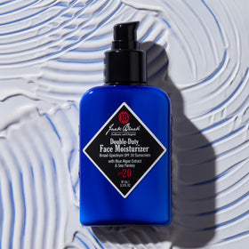Jack Black Double Duty Face Moisturizer SPF 20 in bathroom setting