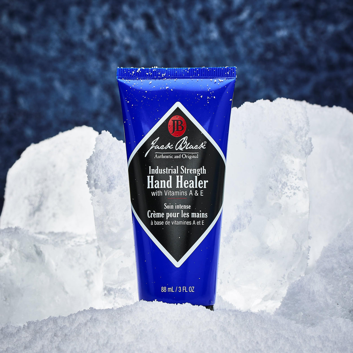 Jack Black Industrial Strength Hand Healer applied on hands, showcasing texture