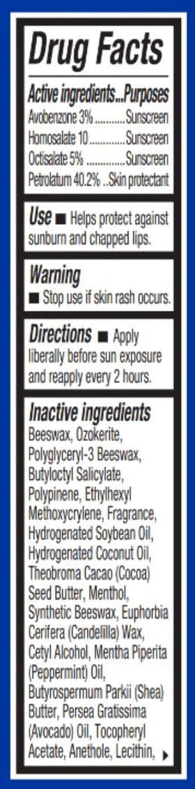 Jack Black Intense Therapy Lip Balm Natural Mint & Shea Butter on a wooden surface