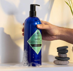 Jack Black JackZen Cleanser bottle with bamboo and violet design