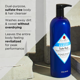 Jack Black Turbo Wash 33 Fl Oz with rosemary sprigs