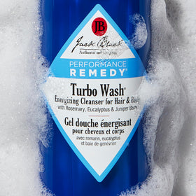 Jack Black Turbo Wash Energizing Cleanser 3 Fl Oz on a bathroom shelf