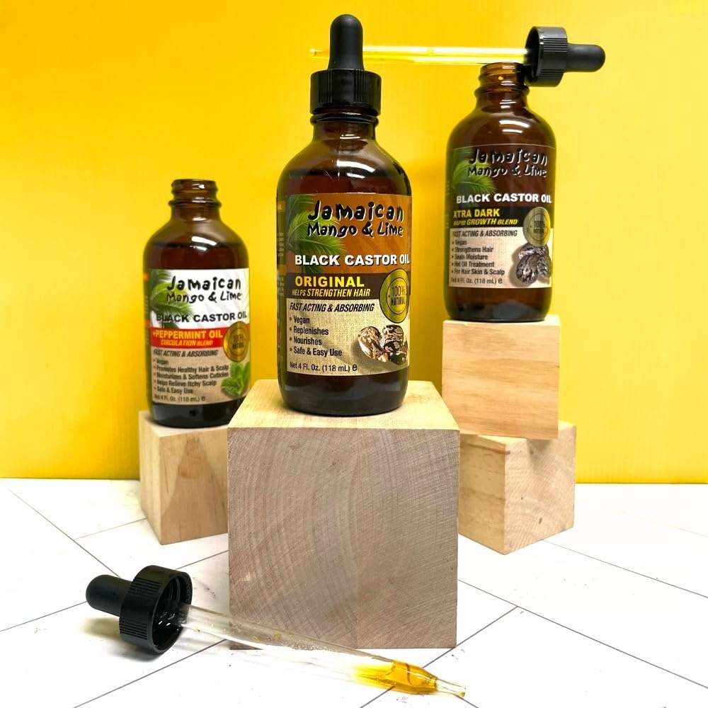 Jamaican Mango & Lime Black Castor Oil Peppermint on a wooden surface