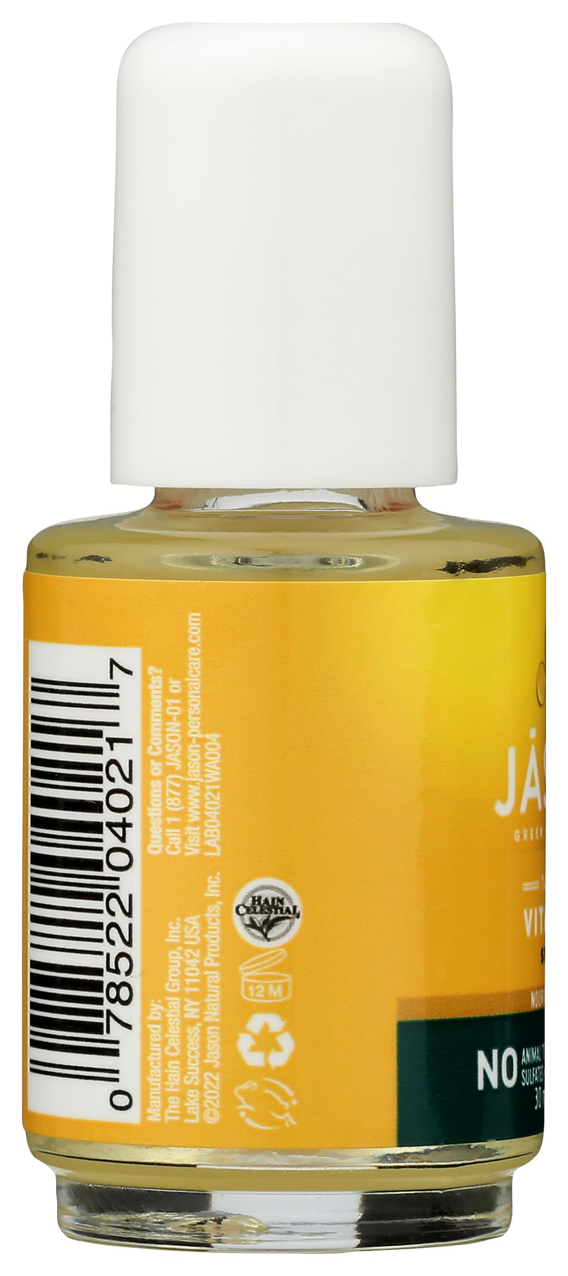 JASON Vitamin E Moisturizing Oil on a wooden surface