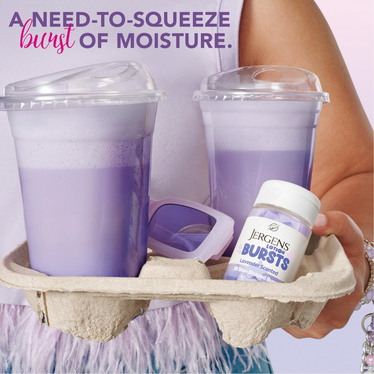 Jergens Lavender Lotion Bursts in hand showing squishy texture