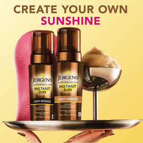 Jergens Natural Glow Instant Sun Bundle displayed on a vanity
