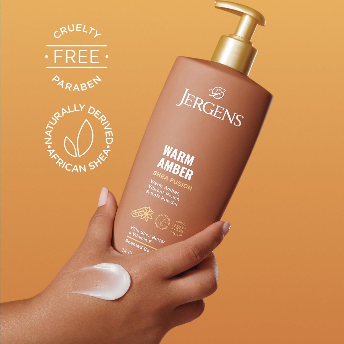 Jergens Shea Fusion Body Lotion Warm Amber on a bathroom counter