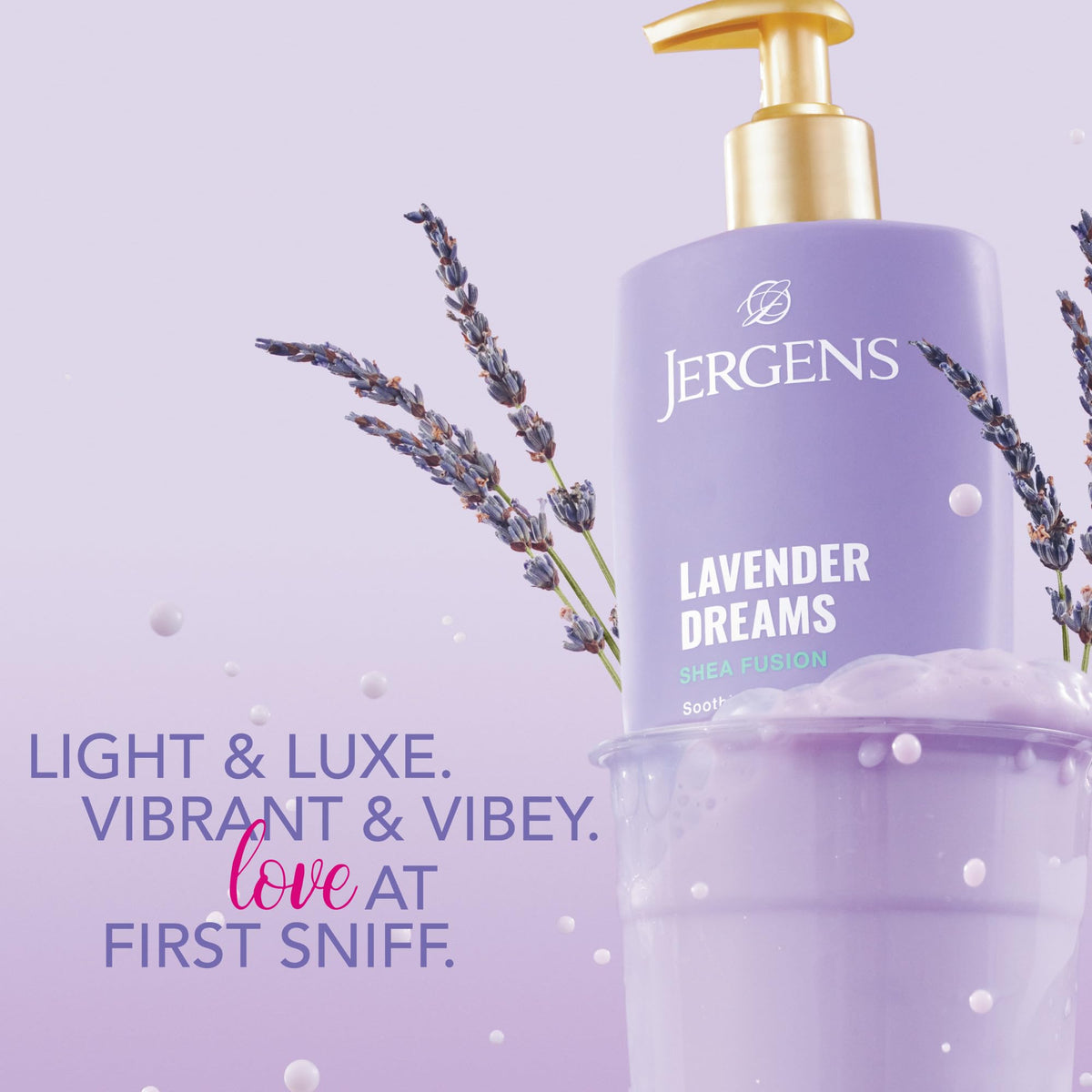 Jergens Shea Fusion Lavender Dreams Body Lotion on a wooden table