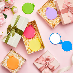 Jetec compact mirror in hand for makeup application