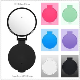 Jetec compact mirror in pink colour on a cosmetic table