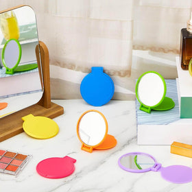 Jetec compact mirrors displayed in a cosmetic bag