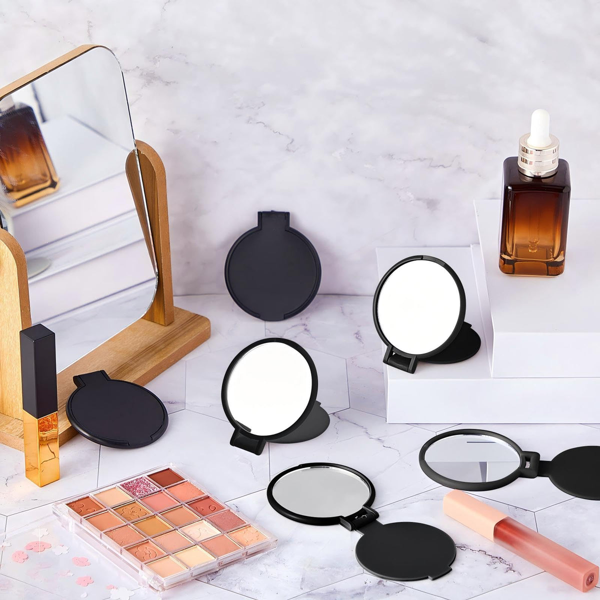 Jetec compact mirrors stacked for display