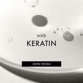 John Frieda Frizz Ease Flat Iron Spray application demonstration