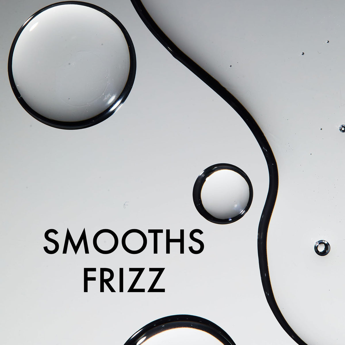 John Frieda Frizz Ease Leave-In Conditioner application on hair