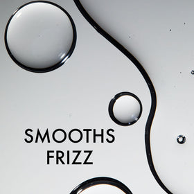 John Frieda Frizz Ease Leave-In Conditioner application on hair