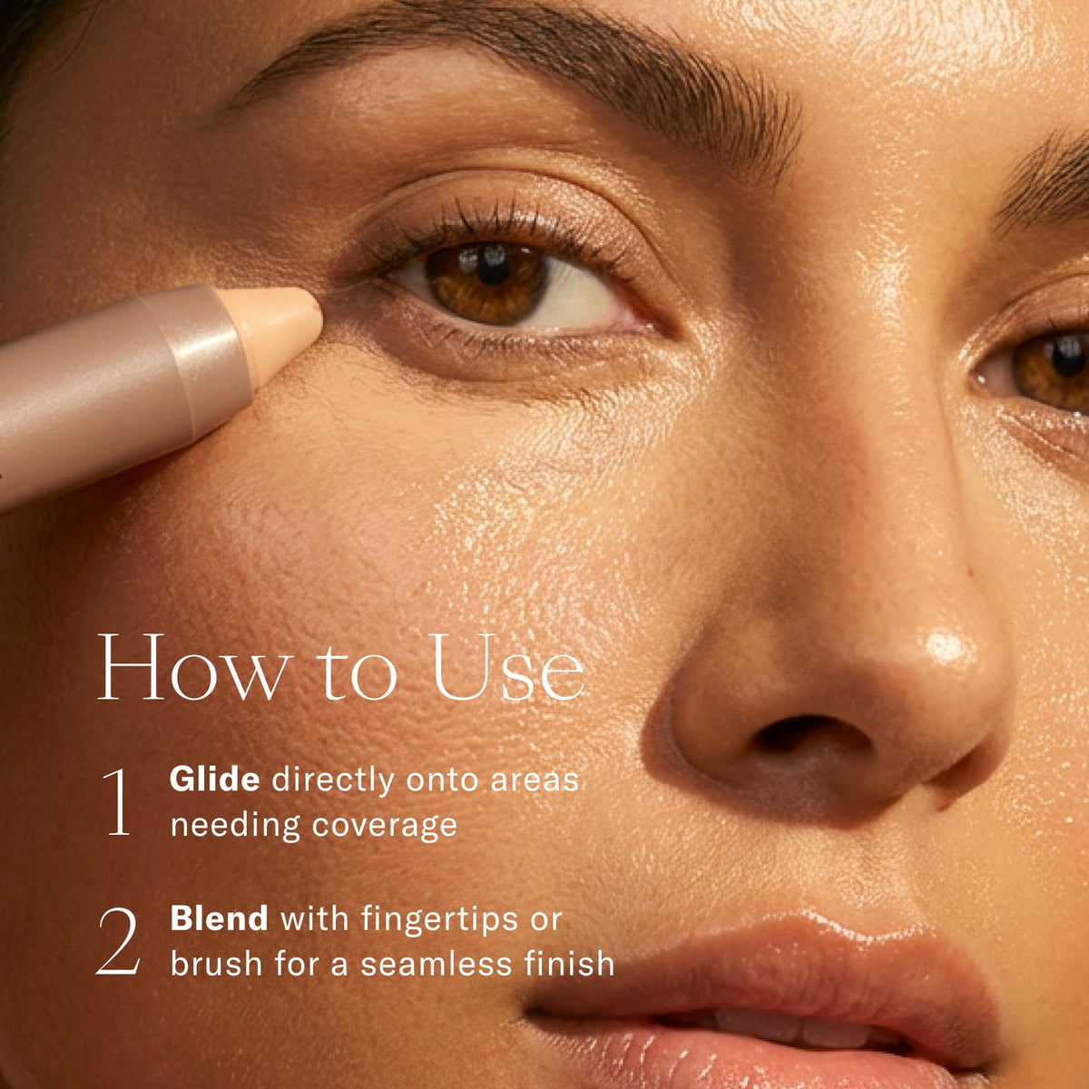 Josie Maran concealer crayon in hand