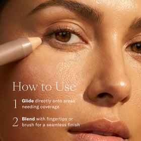 Josie Maran concealer crayon in hand