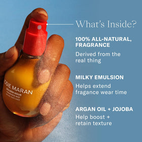 Josie Maran Vanilla Vibezzz mist being sprayed on skin