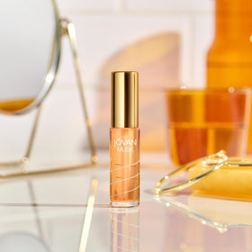 Jovan Musk Perfume Oil displayed on a vanity