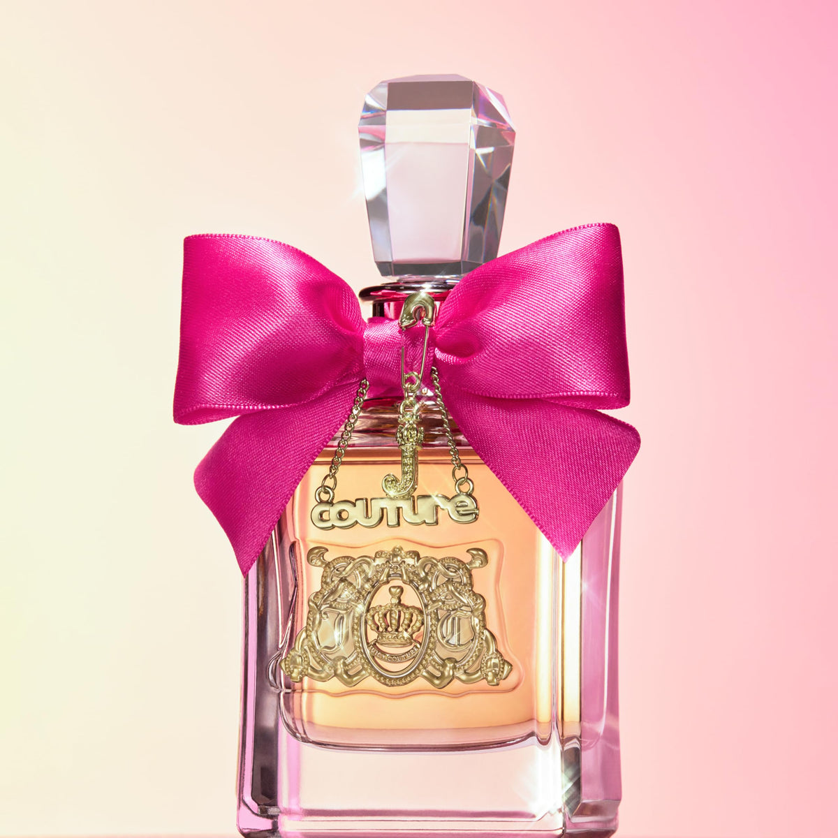 Juicy Couture Viva La Juicy Eau de Parfum 3-Piece Gift Set displayed with floral background