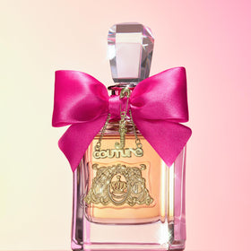 Juicy Couture Viva La Juicy Eau de Parfum 3-Piece Gift Set displayed with floral background