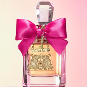 Juicy Couture Viva La Juicy Eau de Parfum bottle on a vanity