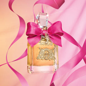 Juicy Couture Viva La Juicy Eau de Parfum bottle on vanity