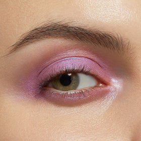 Juicy Gossip metallic cool silvery baby pink eyeshadow stick close-up