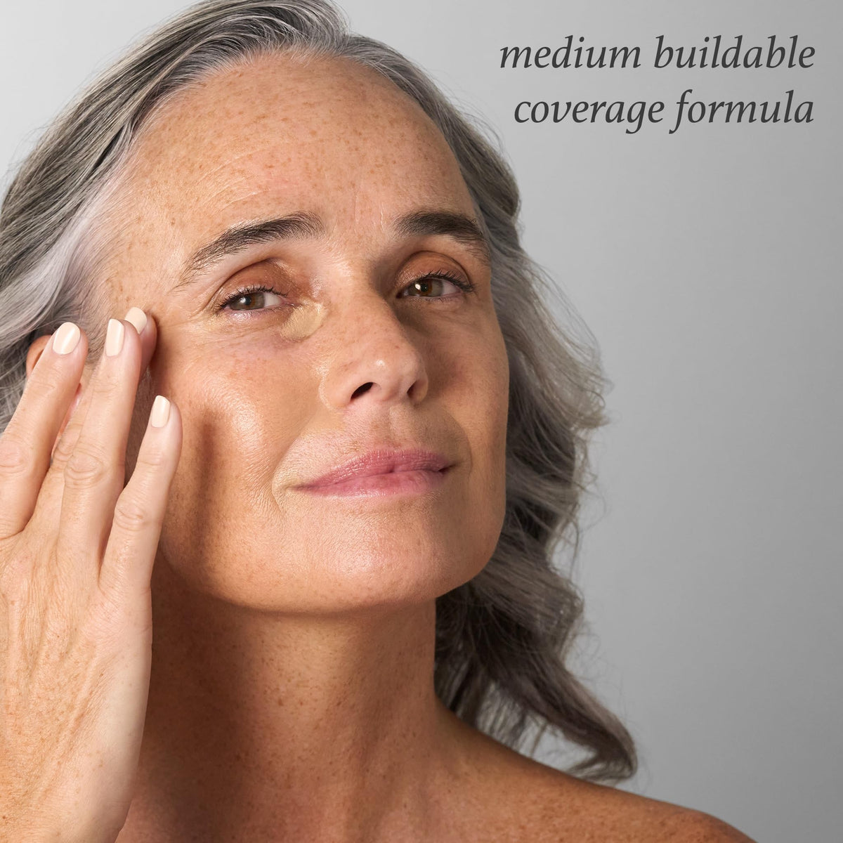 Julep Cushion Complexion Concealer Nutmeg in use on model