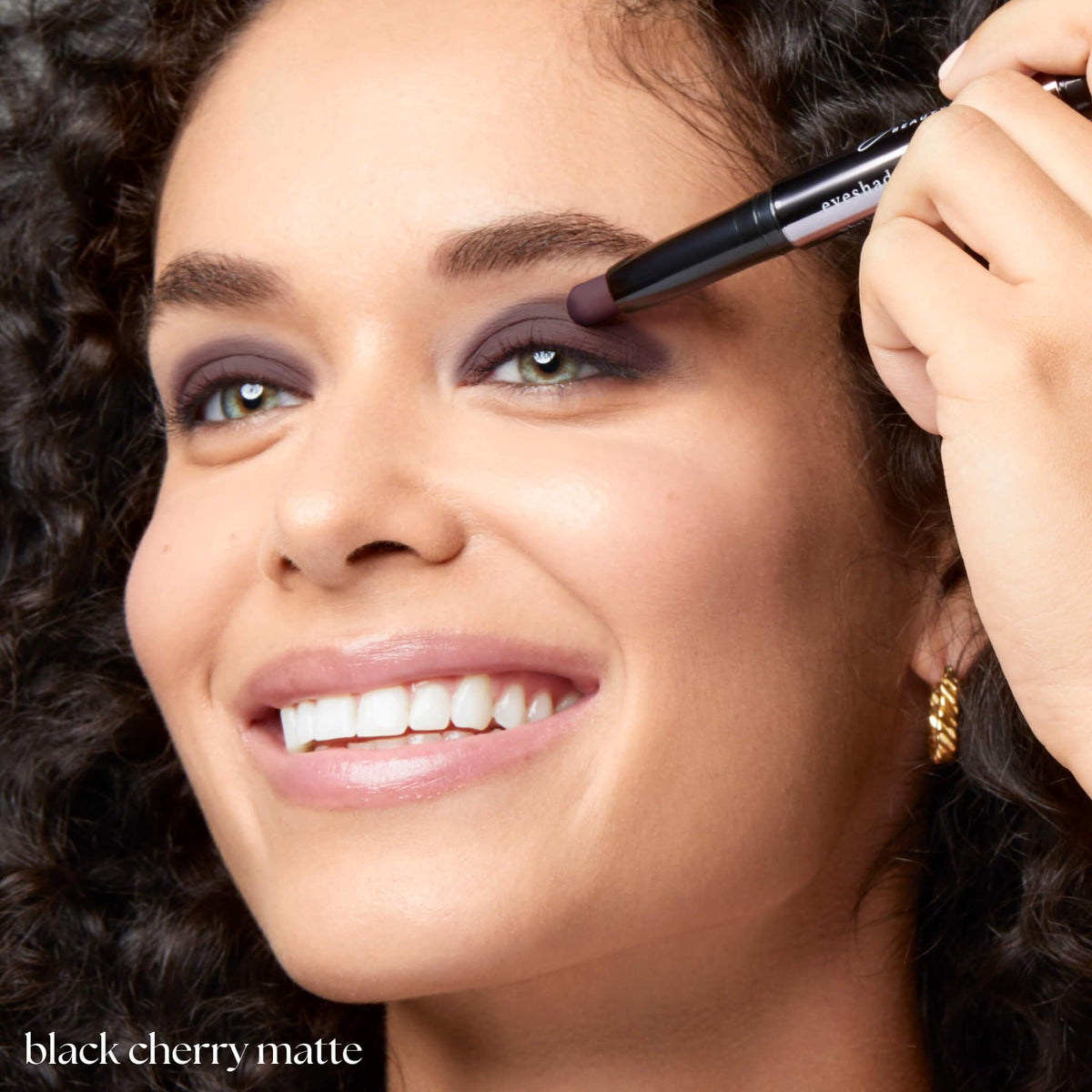 Julep Eyeshadow Stick Black Cherry Matte on a makeup table
